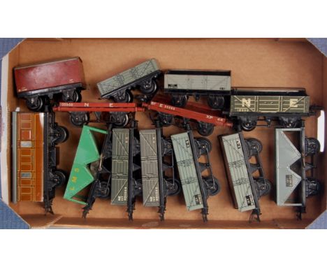 A tray of 13 assorted Hornby postwar wagons including LMS hopper, 3x NE open, 2x BR open with sheet rail, BR hopper, BR flat,