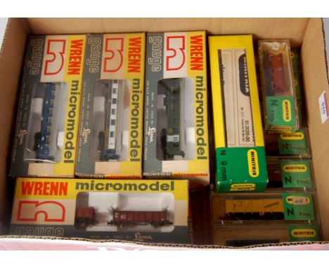 Quantity of N gauge continental outline models, 2-6-0 engine and tender, 6 coaches and 12 wagons all by Minitrix and Lima Wre
