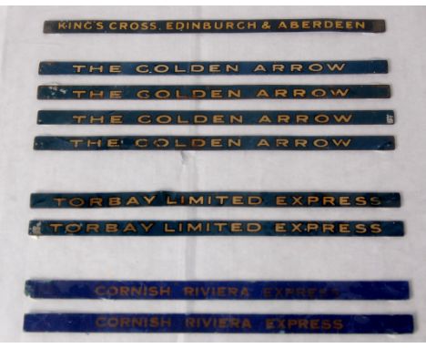 9 x Hornby train name boards including a set of 4 x no. 5 'The Golden Arrow' 1932-5 tinprinted blue and gold, 2 x no. 8 'Torb