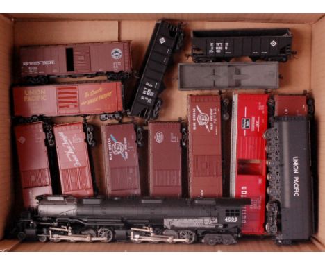 Tray containing Rivarossi Union Pacific 'Big Big' engine and tender together with 12 freight cars, all fitted with Kaydee cou
