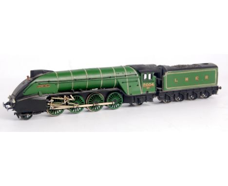 A white metal kit built Mikado 2-8-2 engine and tender, ocall wheels and finished in Darlington green as LNER 2004 'Mons Meg'