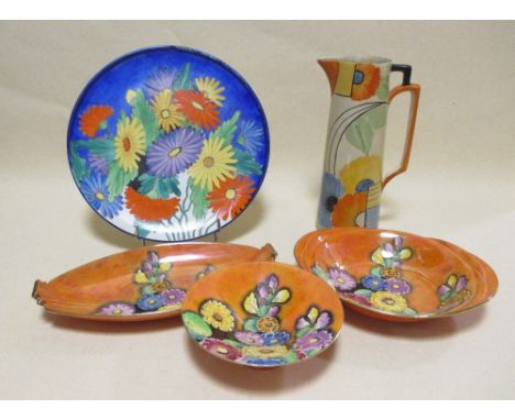 Three pieces of Carlton ware 'Hollyhocks' lustre ware, a Carltonware charger and an early 20th century tall jug (5)  