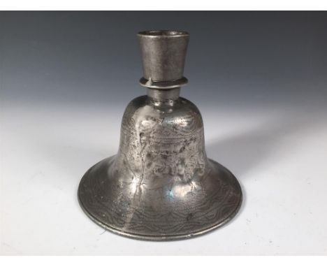 A pewter hookah pipe base, possibly 18th century Persian, the exterior of the bell shaped vessel wriggle worked with peacocks