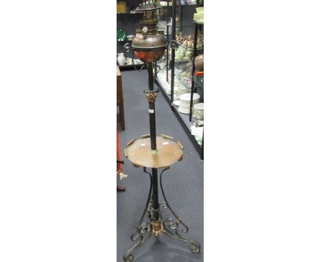 A late Victorian Benson style brass and wrought iron standard lamp  