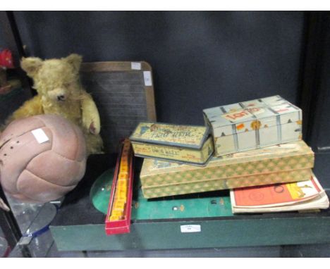 Various old games: a leather Gamages football, block puzzle, Blue bell tobacco tinplate dominoes, teddy bear, and Imp bagatel