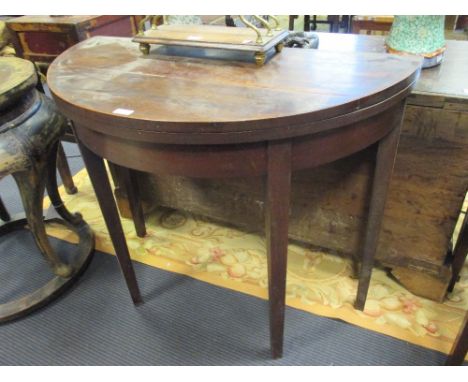 An early 19th century mahogany D-shaped card table, 91 cm wide  