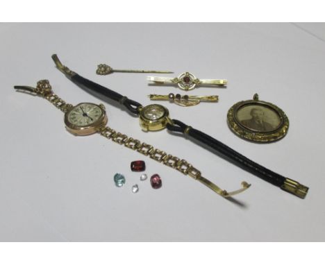 A lady's Omega wristwatch on associated black cord strap, a lady's 9ct cased wristwatch on later 9ct strap, two bar brooches,