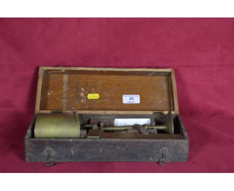 A boxed set of 19th Century Chrondrometer coin scales