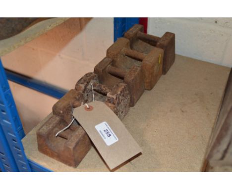 A quantity of graduated sack scale weights 