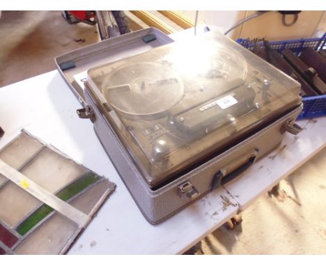A Tanberg reel-to-reel tape recorder (model 7B), with instruction manual, tapes and Perspex cover