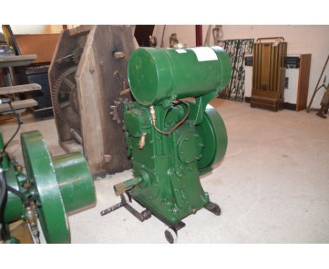 A Petter universal stationary engine (vendor reports it is in running order with starting handle)