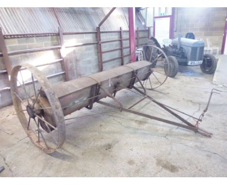 A Massey Harris No. 717 fertiliser distributor - appearing to be in complete original condition with badge, and operator's ma