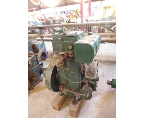 A Lister D stationary engine with starting handle