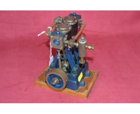 A model steam engine on plinth