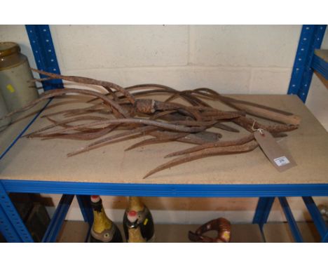 A quantity of pitch fork heads 