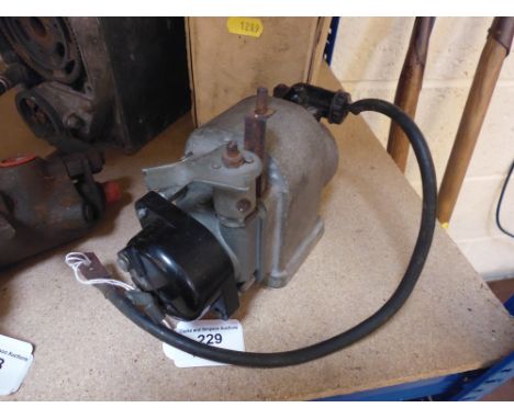 An unused Lucas Magneto with advance and retard - for early Lister engine, in original box 