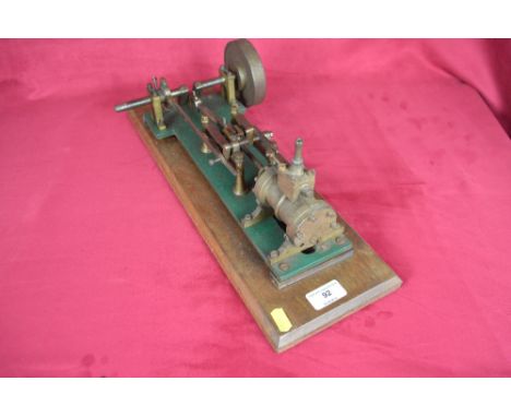 A model steam engine on plinth