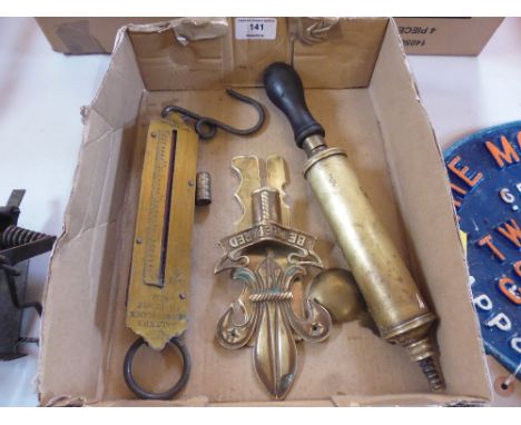 A box of brass items to include a scouts brass staff top; a set of Salter spring balance scales etc.