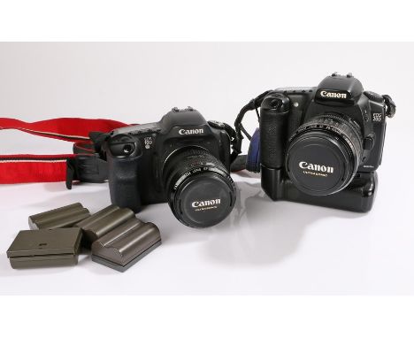 Canon EOS 20D digital camera body with BG-E2 battery grip, Canon zoom lens EF 28-105mm 1:3.5-4.5 lens, Canon EOS 10D camera b