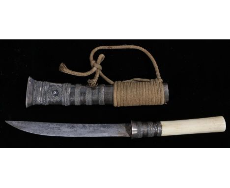 19th Century Burmese dha dagger, the ivory grip above a steel blade and white metal scabbard, 22cm long