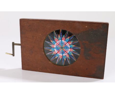 WE &amp; F Newton magic lantern kaleidoscope slide, with rotating handle to one side, 21.5cm wide including handle by 11.5cmK