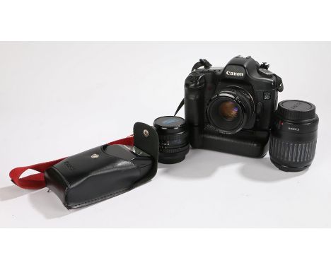 Canon EOS 5D digital camera body with BG-E4 battery grip, EF 50mm 1:1.8mm lens, EF 80-200mm 1.4.5-5.6mm zoom lens, Carl Zeiss