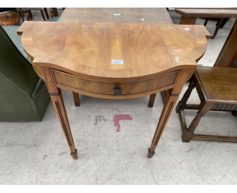 A YEW WOOD CROSSBANDED CONSOLE TABLE BEARING LABEL, BOWLING REPRODUCTIONS (GREGORY &amp; PORRITTS), 30" WIDE 