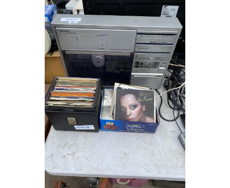 A SHARP RECORD PLAYER SOUND SYSTEM WITH AN ASSORTMENT OF RECORDS 
