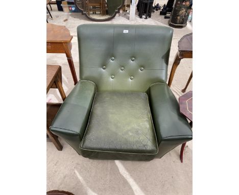 A 1970'S GREEN FAUX LEATHER EASY CHAIR WITH SLOPING ARMS AND BUTTON-BACK 