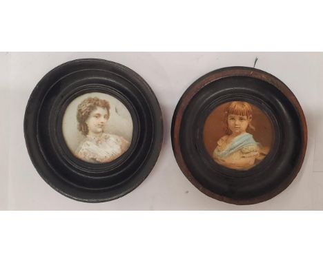 TWO VINTAGE MINIATURE PORTRAITS IN ROUND FRAMES 