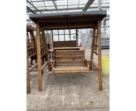 AN AS NEW EX DISPLAY CHARLES TAYLOR TWO SEATER GARDEN SWING SEAT, WITH CANOPY TOP *PLEASE NOTE VAT TO BE CHARGED ON THIS ITEM