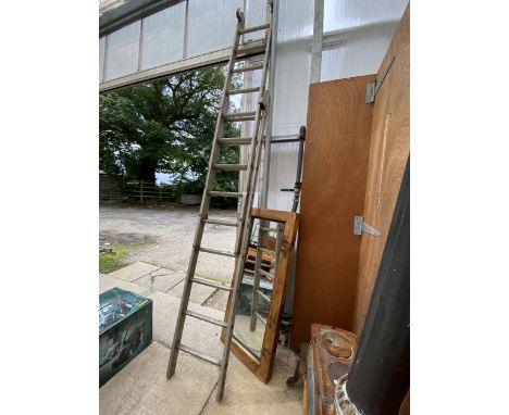 A LARGE DOUBLE LADDER, 18 RUNG 