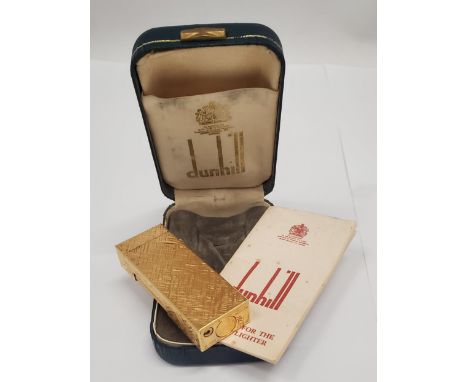 A VINTAGE BOXED AND UNUSED DUNHILL LIGHTER 