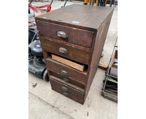 A VINTAGE SEVEN DRAWER WOODEN TOOL CABINET COMPLETE WITH VARIOUS TOOLS (ONE DRAWER MISSING) 