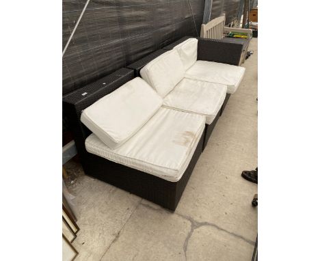 A THREE SEATER RATTAN GARDEN SOFA 