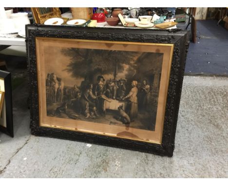 A LARGE VINTAGE BLACK ORNATE FRAMED ENGRAVING 