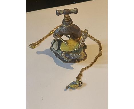 AN ARORA HIDDEN TREASURES HAND PAINTED BLUE TIT DRINKING FROM A TAP TRINKET BOX EMBELLISHED WITH CRYSTALS AND CONCEALING A MA