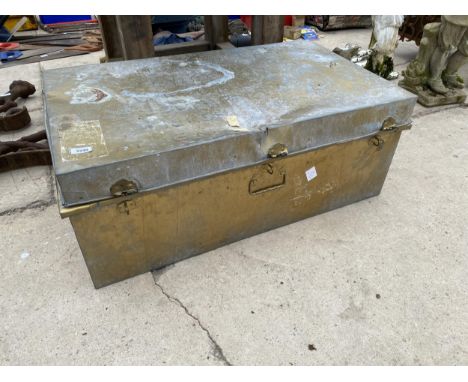 A METAL TRAVEL TRUNK 