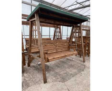 AN AS NEW EX DISPLAY CHARLES TAYLOR THREE SEATER SWING SEAT BENCH, WITH CANOPY TOP *PLEASE NOTE VAT TO BE CHARGED ON THIS ITE