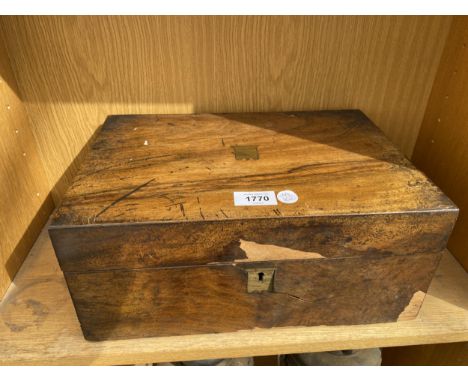 A VINTAGE MAHOGANY WRITING SLOPE WITH INNER BLACK SLOPE 