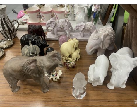 A COLLECTION OF ELEPHANT ANIMAL FIGURES, CERAMIC AND GLASS EXAMPLES ETC 