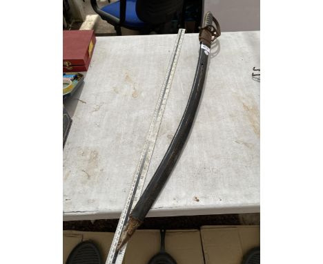 A VINTAGE OFFICERS SWORD AND SCABBARD 