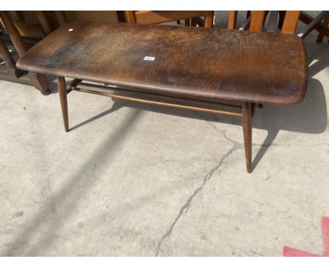 A RETRO ELM COFFEE TABLE WITH MAGAZINE SHELF 