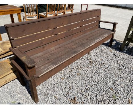 A LARGE VINTAGE WOODEN GARDEN BENCH 