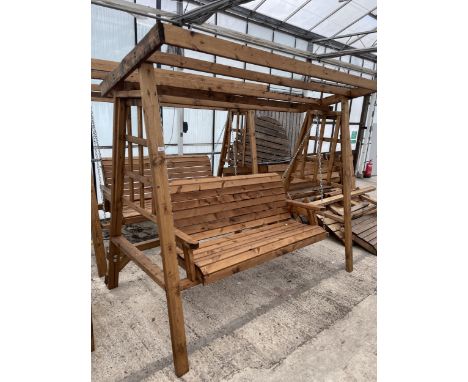 AN AS NEW EX DISPLAY CHARLES TAYLOR THREE SEATER SWING SEAT BENCH, NO CANOPY TOP *PLEASE NOTE VAT TO BE CHARGED ON THIS ITEM*