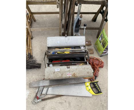 A METAL TOOLBOX AND CONTENTS TO INCLUDE SAWS, HEAT GUN, ETC 