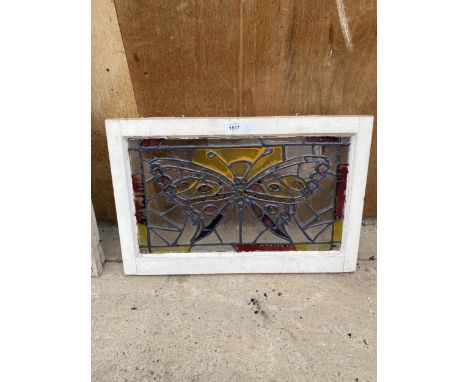 A VINTAGE LEADED GLASS PANEL WITH BUTTERFLY DESIGN 