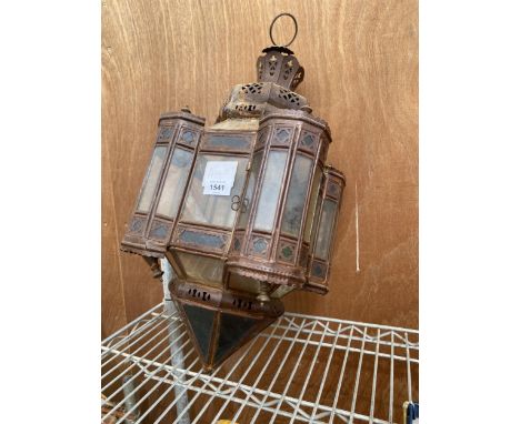 A VINTAGE METAL HANGING LANTERN 