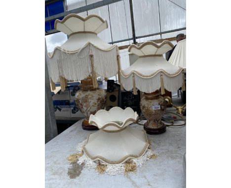 TWO VINTAGE DECORATIVE TABLE LAMPS WITH CREAM SHADES AND FURTHER SHADE 