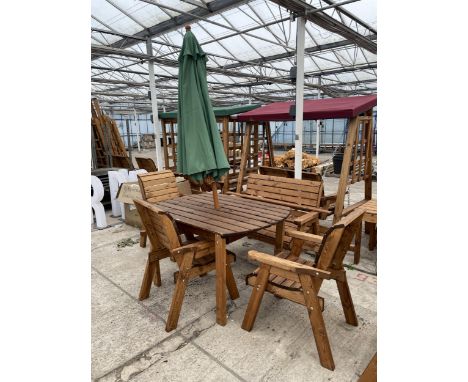 AN AS NEW EX DISPLAY CHARLES TAYLOR PATIO SET COMPRISING OF AN OVAL TABLE AND THREE CHAIRS AND A TWO SEATER BENCH AND PARASOL